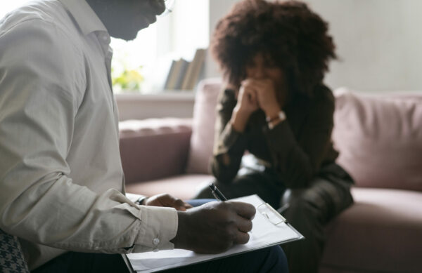 person-sharing-feelings-emotions-therapy-session